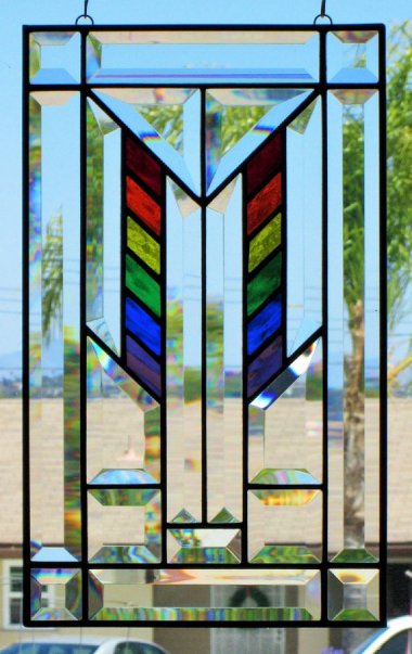 Wonderful Craftsman-style stained glass panel. By dreamworkspb who makes many gorgeous, affordable rainbow stained glass things!