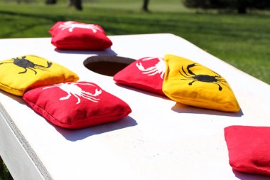 The objective is to get the crabs in the corn hole. Wait. That doesn't sound right.