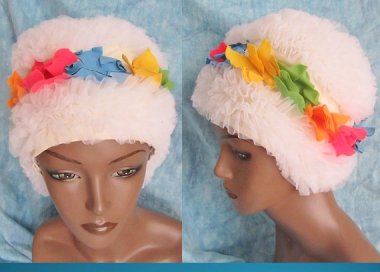 I still have a soft spot for these things. They remind me of my mother's bathing costume on family vacations in the sixties. By GabAboutVintage