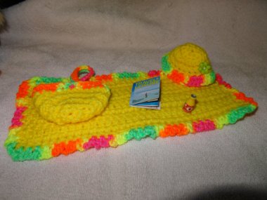 Now your dolls don't have to feel left out of the ugly Etsy fun! Barbie-sized crocheted beach blanket, hat, and beach bag.
