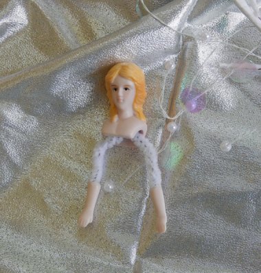 This is a kit to make an angel tree topper, but I kind of like her the way she is.
