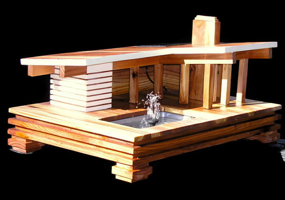 This one's got a working solar-powered water feature! By MidCenturyWoodShop