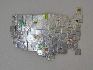 $250,000. The materials listed are foil, aluminum, usa, tape, glue, and scotch. Not scotch tape. Scotch. That makes perfect sense.