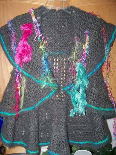 Is it fashionable? No. Will it keep you warm? Nope. But the cats will love it!