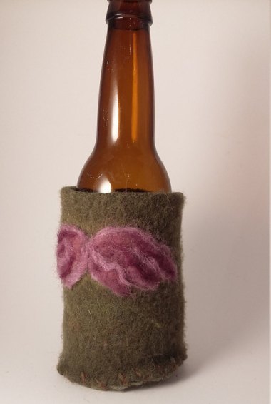 Beer "cozy." Should be called a beer itchy.