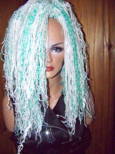 She could not look more tragic if she were wearing an actual mop on her head.