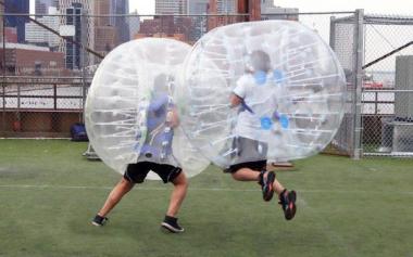 Set of 12 Bubble Ball Soccer Suits ($2,099). I so want to do this!