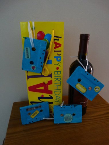 "Upcycled" cassette tapes for use as gift tags and tree ornaments. There's a whole Etsy shop full of this junk.