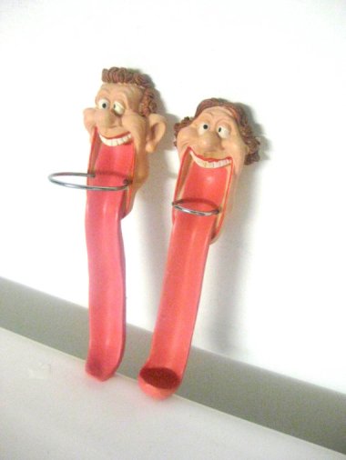 Terrifying "children's" toothbrush holders. This is how bad dental hygiene gets started.