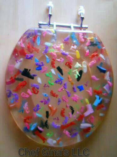 Always wanted Barbie to kick your ass? Well, you're in luck! $350 custom-made barbie shoe toilet seat. Because Etsy.