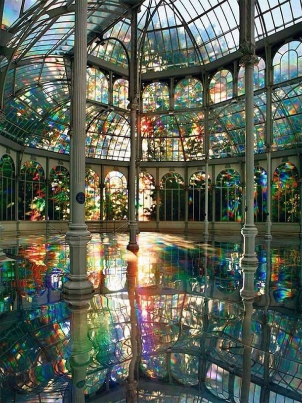 Kimsooja installation at the Palacio de Cristal, Parque del Retiro, in Madrid. The windows of this 1800s greenhouse were covered with a special translucent film to create naturally-occurring rainbows